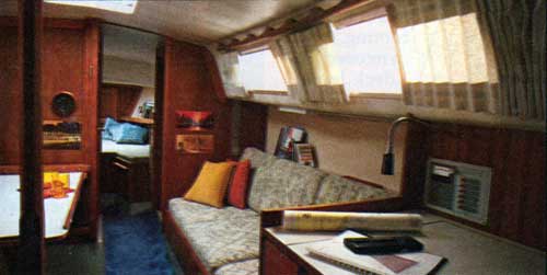 The CAL 34-III Yacht Below Decks with Traditional Teak Paneled Cabin