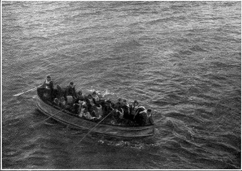 Survivors Aboard a Collapsible from the Titanic, the Boat Being Rowed Slowly Towards the Carpathia, Immediately before the Rescue of the Passengers.