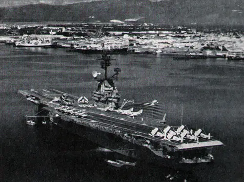 The USS Intrepid enters Kingston, Jamaica, harbor for a visit.