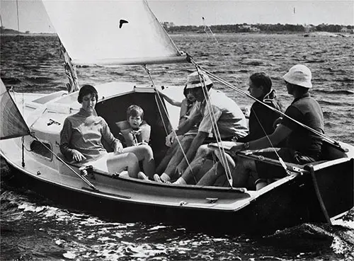Close-Up of a Family Enjoying an Outing in the New 1971 O'Day Mariner 2+2 Sailboat.