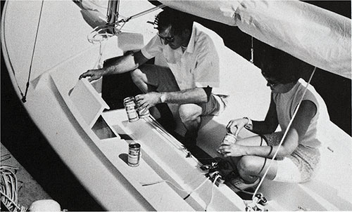 A Couple Enjoys Some Relaxing Moments on Their New 1971 O'Day Javelin Sailboat.