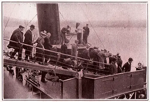 Passengers Disembark Onto Tender at Fishguard circa 1910.