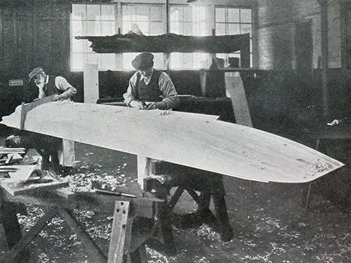 Building the New Cunarder Aquitania. Preparing a Wooden Model.