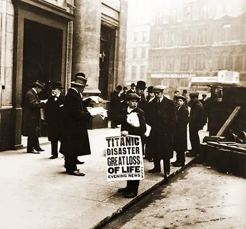 A Newspaper Boy in London Holds the Evening Newspaper, Splashing the Headline of 'Titanic Disaster. Great Loss of Life.'