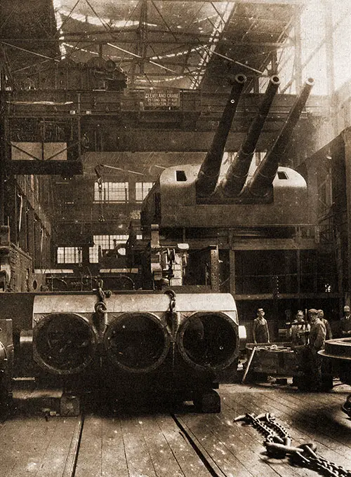 In This Picture, an 8-Inch Triple Mount of the Type Used on the Louisville Class of 10,000-Ton Heavy Cruisers Is Being Assembled.
