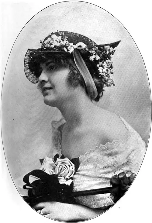 Restaurant Hat of Chantilly Lace with Top and Bandeau Trimming of Flowers, Shown by The Hart & Co., Cleveland.