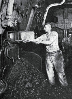 The Stoker at Work in a steamship circa 1910