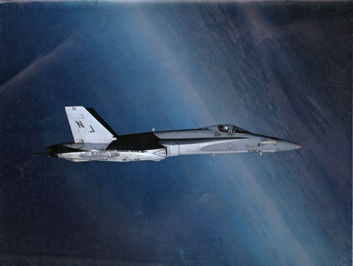 MAJ Rob Savio brings VFA-12S F/A-18A ”over the top” on the backside of a loop near Yuma, 26 January 1982. Story pages 40-43. (Bob Lawson). 