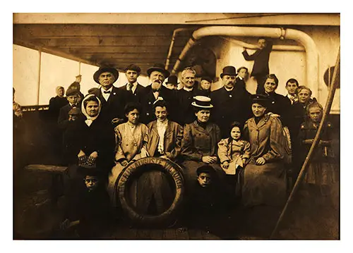 Group of Immigrant Passengers on the Deck of the SS Kaiserin Auguste Victoria, c1910.