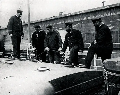 Captain Berends Inspects the Deck of the SS Augusta Victoria with Senior Officers and Staff.