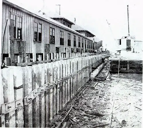 Concrete Sheet Piles in Place, Section I (Northwest Side of Island Three), August 1, 1934.