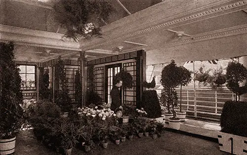 This Gay Glimpse of the Gardener's Corner on the Mauretania Shows Some of the Lovely Flowers That Brighten the Great Ship.
