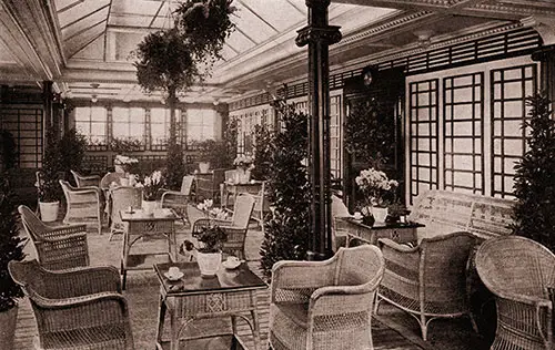 The Veranda Café on the Mauretania Is So Attractive, with Its Light Wicker Furniture, Its Flood of Sunlight, and Its Trailing Greenery, That You Would Think You Were on Some Country-Club Piazza.