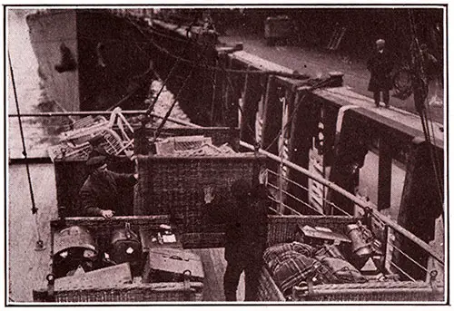 Landing Passenger's Luggage at Quayside at Fishguard, 1913.