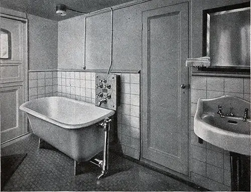 Cabin-Class Bathroom showing Tub and Sink Fixture.