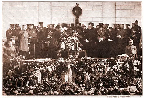 President Harding and Navy Secretary Denby Pin Congressional Medal of Honor on Casket. Underwood & Underwood.