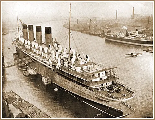 Plate LXX Fig. 47:- The Mauretania in the Fitting-Out Berth at the Wallsend Shipyard.