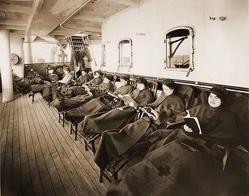 Red Cross Nurses Relax On Their Deck Chairs on the SS Red Cross.