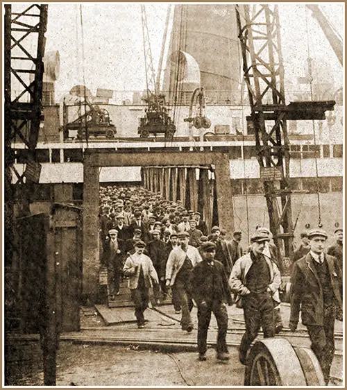 Workmen Leaving the Mauretania at Swan, Hunter & Wigham Richardson, Ltd., Wallsend-on-Tyne, Newcastle, England Shipbuilding Yard.