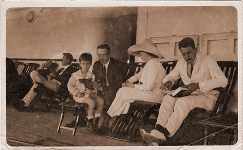 Unidentified First Class Passengers Relaxing on Deck on the SS Vandyck of the Lamport & Holt Line During This Voyage.