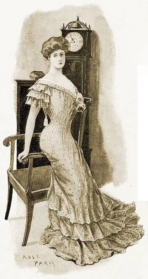 Smart Model for a Gray Tulle Princesse Evening Gown Spangled With Charming - Designs To Be Silver; Flat Capuchon, With Silver Tassel, Continued To Form Revers.