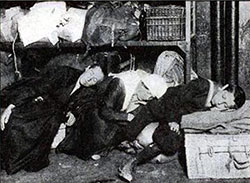 Overcrowding at Ellis Island Causes Unusual Sleeping Arrangements for Immigrants.