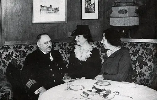 Captain Friedel Entertains Helen Keller and Anne Sullivan on the SS Deutschland.