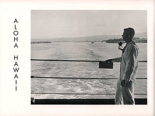 A Sailor Stands Watch As the USS Shangri-La Leaves Pearl Harbor, Hawii.