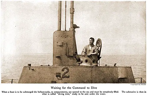 A crewman on Conning Tower Waits for the Command to Dive.