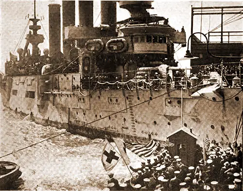 Cruiser USS Charleston Arriving at Hoboken with Return Troops.