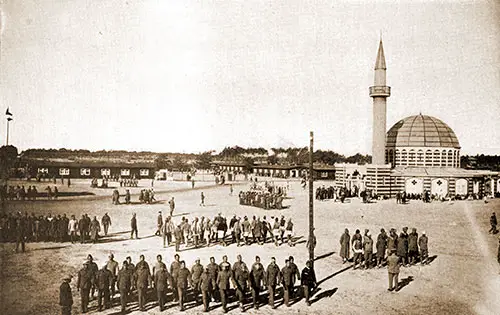Mohammedan Prisoners of War Being Drilled and Disciplined in Training for Entering the German Army. the Mosque in the Background Was Built as a gift from the German Emperor to the Mohammedans.