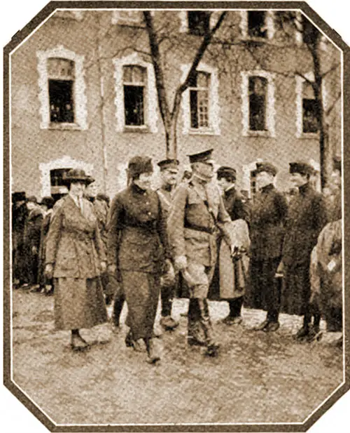 The "General Pershing Inspection" -- At Which the Camera Caught the General Just as He Passed the Smiling Miss Erickson.