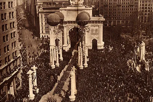 27th Division Passing under Victory Arch, New York Amid Greatest Throngs Ever Gathered in America.