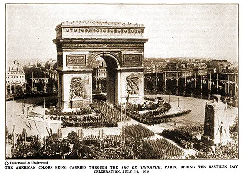 The American Colors Being Carried Through the are de Triomphe, Paris During the Bastille Day Celebration on 14 July 1919.