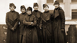 Part of the First Unit of Telephone Operators to Go to France, Shown Wearing Their Service Overcoats.