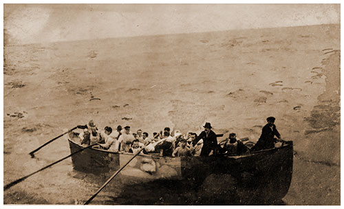 Some of the Survivors from the Sinking of the SS Antilles in a Lifeboat, 17 October 1917.
